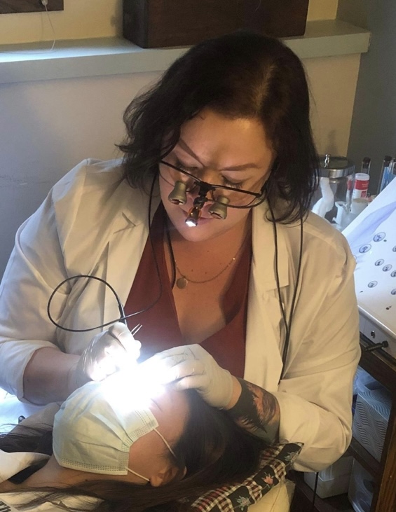 Cadence performing electrolysis on a patient for permanent hair removal conveniently located in Onalaska, WI.